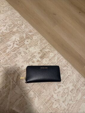 Michael Kors Black Zip-Around Leather Wallet with Gold Hardware